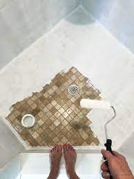 Although i'm an experienced painter and typically do not tape, it was an essential step this time. How To Paint Bathroom Tile Floor Shower Backsplash Shower Floor Tile Painting Shower Painting Bathroom