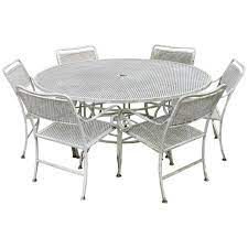 We have an assortment of patio tables that comfortably gathers family, friends and pets. Seven Piece Cast Aluminium Scroll Arm Metal Patio Dining Set Table And Six Chairs For Sale At 1stdibs