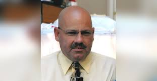 Obituary information for Raymond Darrell "DJ" Strickland...