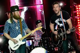 Osborne of the brothers osborne band has come out as gay, making him the the band teased t.j.'s interview on social media, which prompted an outpouring of support from fans. Brothers Osborne Songs The Duo S 6 Best Tunes So Far