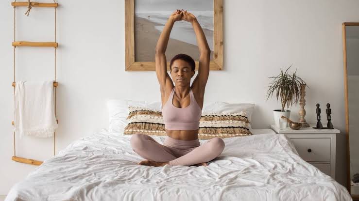Morning yoga flow from bed to mat
