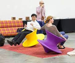 spun chair has the appearance of a sculptural vessel but when leaned on its side it becomes a fun and functional ch chair herman miller kids room inspiration