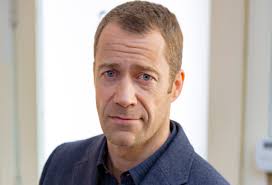 Colin Ferguson as Macintyre Sullivan in the Fixer Upper Mysteries