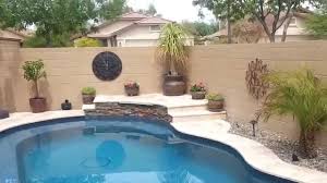 A talented pool designer can work. Small Yard Pool Project Huge Transformation Youtube