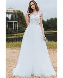 In case if it's too chilly for a strapless dress or you are looking for something comfier to wear, a cap sleeve wedding gown is a perfect solution. Modest Lace A Line Beach Wedding Dress Cheap Boho Cap Sleeves Long Flowing Tulle Df6408 Gemgrace Com