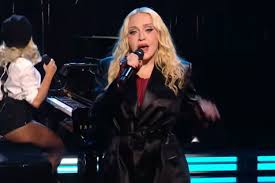 Madonna Puts a Sultry Spin on Menswear in a Bustier, Blazer and Thigh-High Boots at the 2026 MTV VMAs