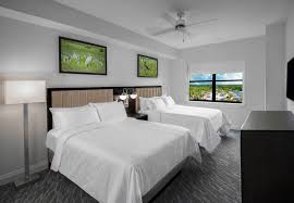 Bedroom with two beds layout. 2 Bedroom Suites In Orlando The Grove Resort Water Park Orlando