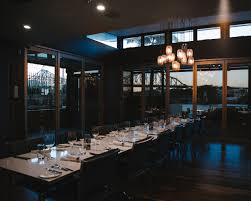 A designer who has a masterful way with color, the blue walls, ceiling and velvet blue chairs are striking combination in this stunning dining area. Functions Venue Brisbane Alchemy