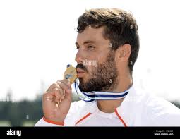 Racice, Czech Republic. 27th Aug, 2017. Winners of the Men K1 200 m, L-R  BENCE HORVATH (Hungary, second place), LIAM HEATH (Britain, first place),  ALEKSEJS RUMJANCEVS (Latvia, third place), celebrate with medals