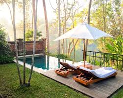 The lush garden's gazebo in a great spot for yoga and a massage. Como Uma Ubud Luxury Hotel Fly Stay Luxe