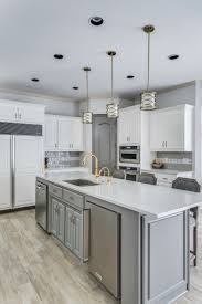 Maybe you would like to learn more about one of these? Grey And White Kitchen White Cabinets With Grey Subway Tile And A Decorative Glass Modern Kitchen Cabinet Design Kitchen Design Kitchen Interior Design Modern