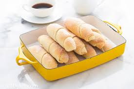 How To Make Spanish Bread A Popular Filipino Sweet Bread Soft Luxuriously Soft Bread Sticks Coiled Like Croissants Beautif Spanish Bread Bread Soft Food