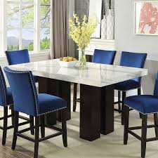 For storage, get a counter height dining room set with a rectangular centerpiece that has shelving, cubbies, or a wine rack. Camila Rectangular Counter Height Dining Set By Steve Silver Furniture Furniturepick