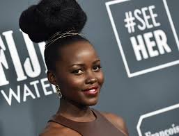 Lupita Nyong'o's stuns in Chanel cape coat
