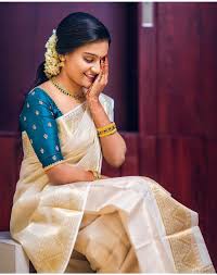 Traditional elegant off white kerala set mundu with golden thick border and fully checked design mak. Blouse Hand Designs Kerala Style Novocom Top