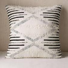 Inside, a polyester filling plumps up this 14'' h x 36'' w accent pillow. Black And White Textured Pillows Off 60