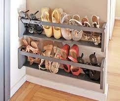 Wall mounted shoe rack is aka the clever shoe storage. Finished Project Inspiration Via Apartment Therapy When I Came Across This Vertical Shoe Storage Solutio Diy Shoe Storage Shoe Storage Solutions Wall Shoe Rack