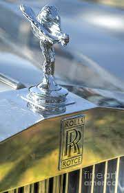 Incidentally, henry royce disliked the figurine, stating it ruined the look of the vehicles. Rolls Royce Emblem Photograph By Amir Paz
