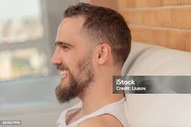 Guy With A Beard Profile Of Face Stock Photo