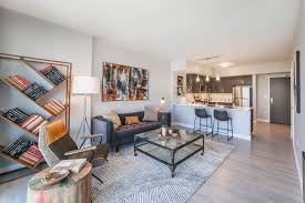 Black And Brown Living Room Rug Modern Open Concept Kitchen And Living Room With Light Hardwood Floors Black And White Ar Rugs In Living Room Brown Living Room Decor Open Concept Living Room