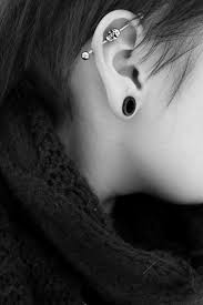 Two piercings are made, one fairly close to the head and the second further down the helix, on the opposite side of the ear. 90 Classical And Wackier Industrial Piercing Ideas