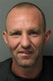 Defendant charged with chainsaw attack accused of threatening judge