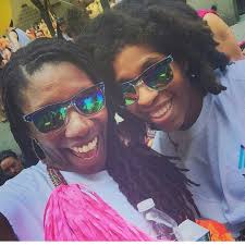 Jamaican Author of "Here Comes the Sun",Nicole Dennis-Benn at the  #NewYorkPride with wife Dr. Emma Benn🌈 #LoveIsLove