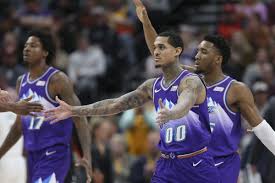 Utah jazz guard jordan clarkson (00) puts in a shot over portland trail blazers forward norman powell (24) during an nba basketball game at vivint arena in salt lake city on wednesday, may 12, 2021. Utah Jazz Guard Jordan Clarkson Will Wear Peace On The Back Of His Jersey Talkbasket Net