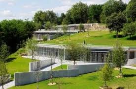 Ronchamp Tomorrow A Monastery And Gatehouse Notre Dame Du Haut In Ronchamp Renzo Piano Building Workshop Maison Enterree Toit Vert Maison D Architecture