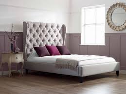 Gray boy's bedroom features a gray bed dressed in gray striped bedding accented with a gray plaid pillow. Bedroom Ideas Upholstered Bed Novocom Top