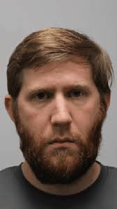 Tennessee teacher who admitted to filming students in locker room cries in  court