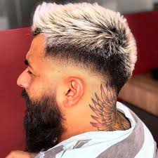 A taper fade haircut has long hair on top with a taper to short hair along the sides and back. 23 Classic Taper Haircuts Trending Styles For Men In 2021