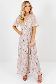 We've got the fashion forward dresses she needs for every special event. Lush Gardens Gray Floral Maxi Wrap Dress Boutique Dresses