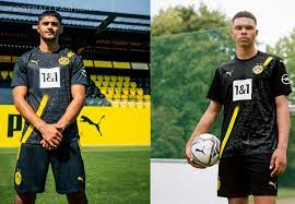 The cuffs are black with white, matching the style of the collar. Borussia Dortmund 2020 21 Puma Away Kit Football Fashion