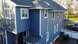 It has a bit of slight green tint in real life but when you see the whole house from a distance it is really a blue look. Blue Nail Roofing Siding Certainteed Vinyl Siding In Color Pacific Blue On This Lovely Home Facebook