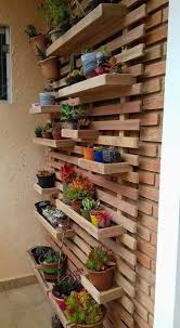 From wooden and metal pots to pallet planters and brackets, there are plenty of options you can take. 20 Creative Diy Wooden Planters For Your Amazing Garden Trenduhome Diy Wooden Planters Vertical Garden Design Garden Diy On A Budget