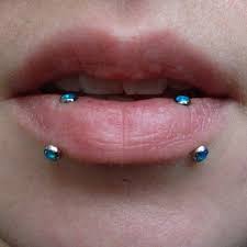 Pin By Heather Shearn On Anatometal Fan Photos Vertical Labret Piercing Labret Piercing Lip Piercing