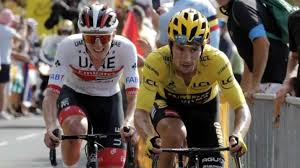 Slovenia's tadej pogacar wins and takes the overall leader's yellow jersey as he crosses the finish line of stage 20 of the tour de france. Tadej Pogacar Wins Stage 15 At Tour De France 2020 Primoz Roglic Retains Lead Other News India Tv