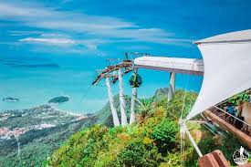 Some tours to the cable car also include a visit to the oriental village or telaga. Premium Travelog Langkawi Cable Car Sky Cab Pantai Kok Attractions