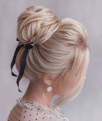 Let the rest of the hair hang loosely underneath the bun to create fun pigtails. 50 Updos For Long Hair To Suit Any Occasion Hair Adviser