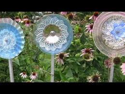 Garden glass flowers made out of reused clear glass dishes diy handmade ideas. Yard Flowers Made Out Of Glass Dishes And Bowls Glass Garden Art Garden Art Glass Garden Flowers