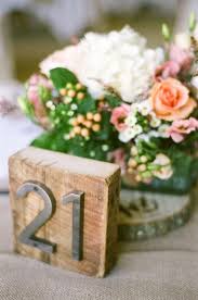 5 Creative Wedding Table Number Ideas Paperblog Creative Wedding Table Numbers Table Numbers Wedding Diy Diy Table Numbers