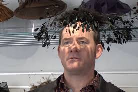 Watch David Koechner Model Exotic Hats With Julie Klausner