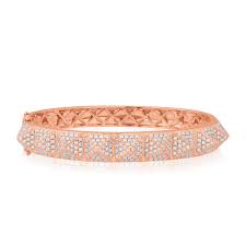 The earrings are spike studs that match the center link on the bracelet. 14kt Rose Gold Diamond Harlow Spike Bangle Bracelet Anne Sisteron