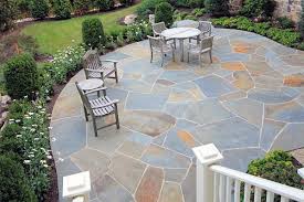 Flagstone is one of the best materials for patios primarily due to its narrow packed joints that allow water to permeate instead of running off. Top 60 Best Flagstone Patio Ideas Hardscape Designs