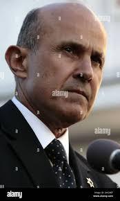 Former Los Angeles Sheriff Lee Baca, middle, with his attorney Michael  Zwieback, right, leave the U.S. Court House building in Los Angeles