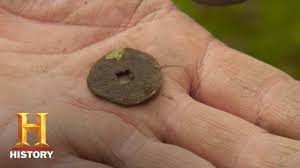 Chinese coin with square hole in the middle. The Curse Of Oak Island Unearthed Coin Provides Crucial Evidence Season 8 History Youtube