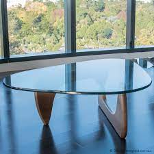 Glass top shows a lot of age, scuffs and scratches as one would expect on a piece this old. Authentic Noguchi Coffee Table From Vitra Design Consigned