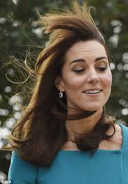 Kate Middleton wears Emilia Wickstead dress and Reiss coat at Action