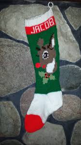 Renee kies' free christmas knitting pattern will keep you toasty all december long. Reindeer With Green Background Custom Knitted Stocking Order Now For Chris Knitted Christmas Stocking Patterns Knitted Christmas Stockings Christmas Stockings